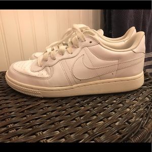 All white Nike Air Force 1s